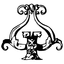 Foliate T with scrolls